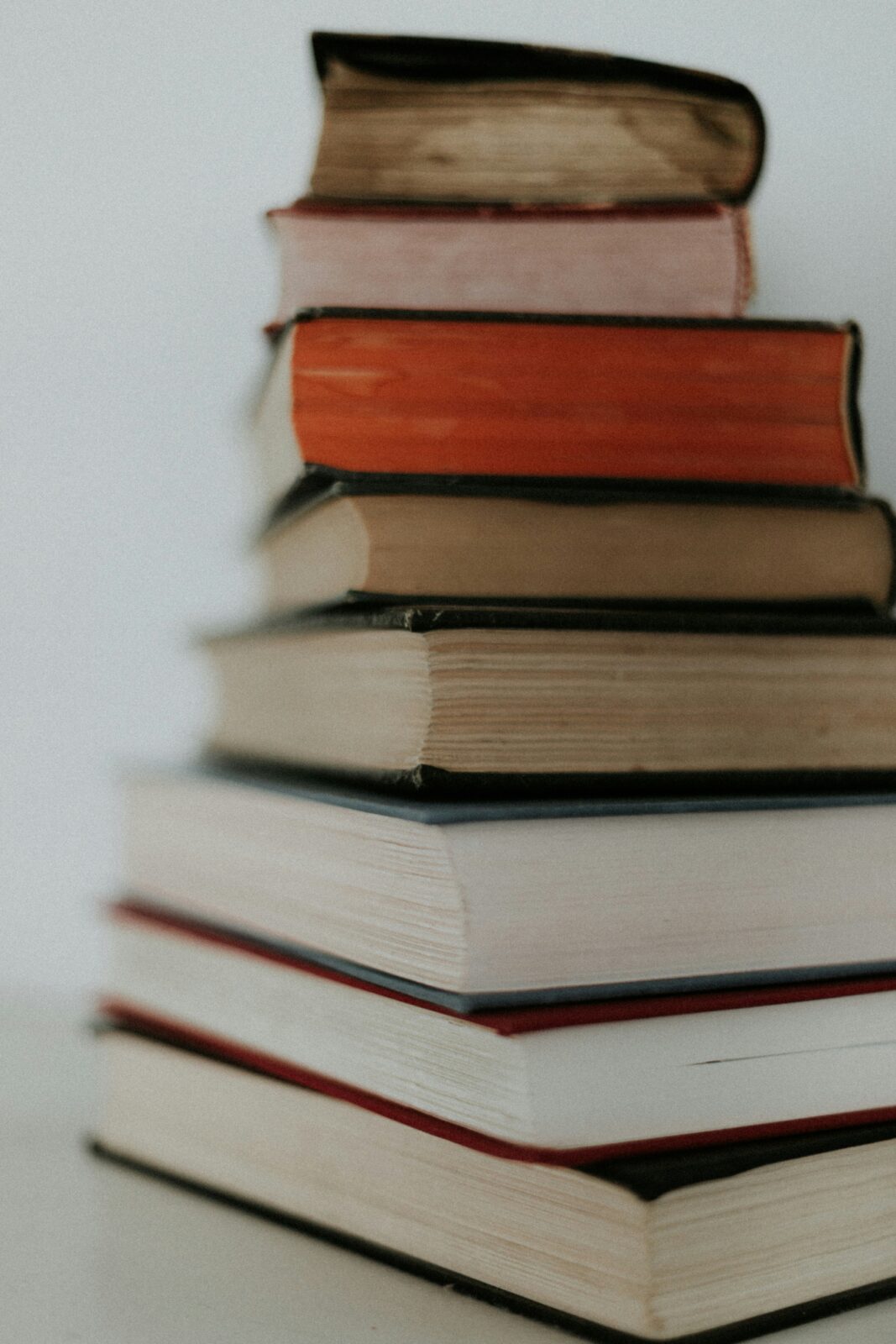 A stack of books. Photo by Priscilla Du Preez 🇨🇦 on Unsplash