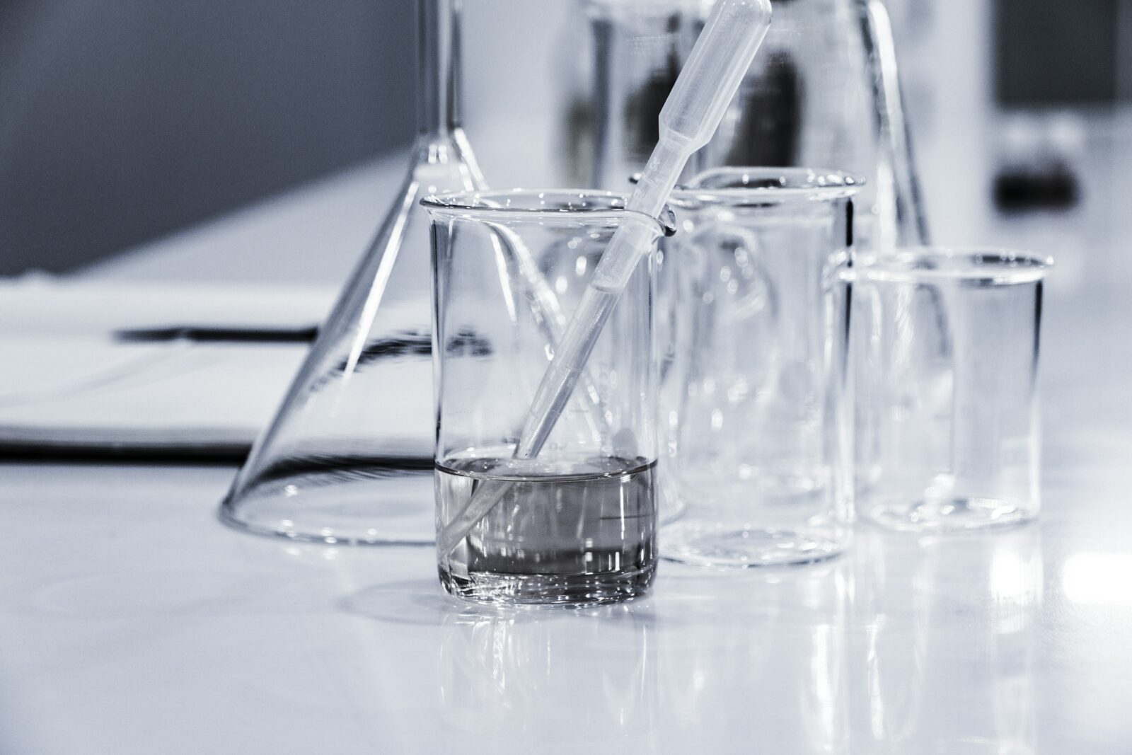 Glassware for chemistry. Photo by Hans Reniers on Unsplash.