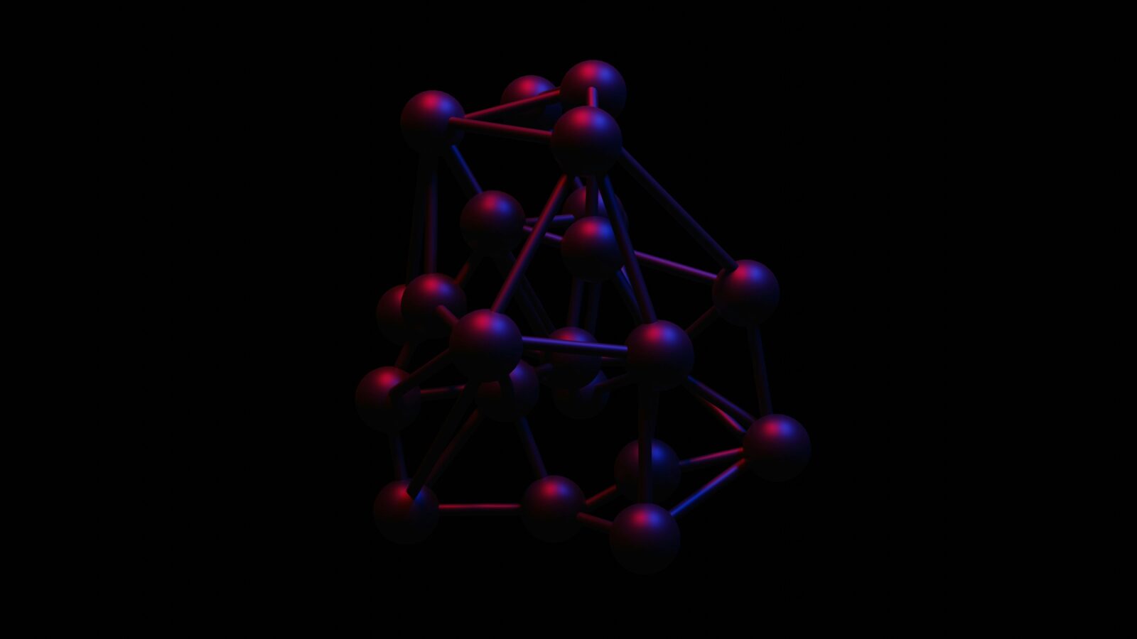 Blue and red model of a molecule. Photo by Jona on Unsplash