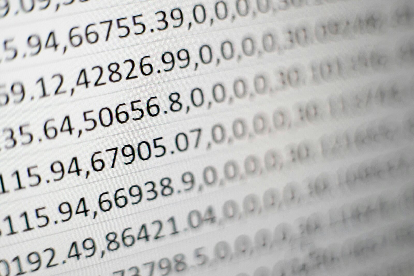 Picture of rows of numbers. Photo by Mika Baumeister on Unsplash.